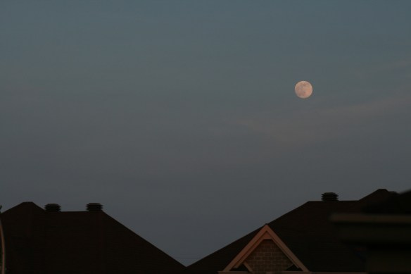 Nearly full moon rising over rooftop  - May 20th, 2016